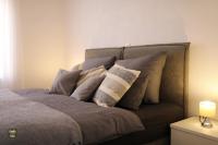 Posteľ alebo postele v izbe v ubytovaní Carmen Apartment Deluxe