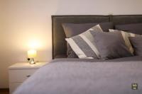 Posteľ alebo postele v izbe v ubytovaní Carmen Apartment Deluxe