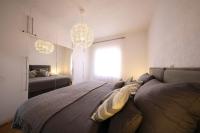 Posteľ alebo postele v izbe v ubytovaní Carmen Apartment Deluxe