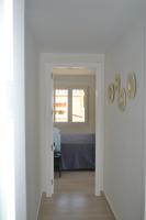 Posteľ alebo postele v izbe v ubytovaní Apartamentos Lunamar