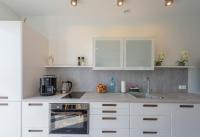 Kuchyňa alebo kuchynka v ubytovaní Apartament Logana z Sauną - 5D Apartamenty