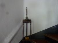 a wooden stand in the corner of a room at L&#39;Auberge Espagnole - Bed &amp; Breakfast in Apt