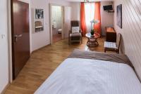 Postel nebo postele na pokoji v ubytování Hotel de la Place