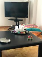 Televízia a/alebo spoločenská miestnosť v ubytovaní aris sweet home 2