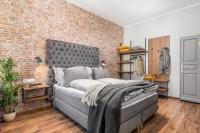 Posteľ alebo postele v izbe v ubytovaní Porto Marina apartments