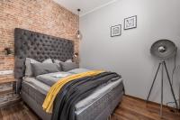 Posteľ alebo postele v izbe v ubytovaní Porto Marina apartments