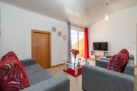 TV a/nebo společenská místnost v ubytování Casa Guadalupana