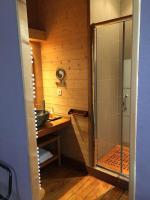 a bathroom with a shower and a sink at Tilleuls et Bambous in Saint-Sauveur-dʼAunis
