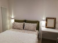 Posteľ alebo postele v izbe v ubytovaní River Inn Arco
