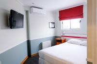 GUANAKO Hostelにあるベッド