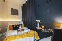 Posteľ alebo postele v izbe v ubytovaní Kolejowa 45A P&O Corporate Accommodation