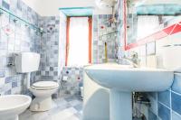 A bathroom at On The Beach La Rena Beddha