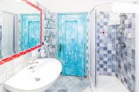 A bathroom at On The Beach La Rena Beddha