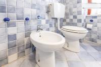 A bathroom at On The Beach La Rena Beddha