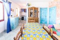 A kitchen or kitchenette at On The Beach La Rena Beddha