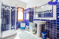 A bathroom at On The Beach La Rena Beddha