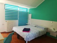 Posteľ alebo postele v izbe v ubytovaní B&B Villa Napoli