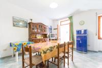 A kitchen or kitchenette at On The Beach La Rena Beddha