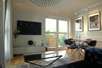 Telewizja i/lub zestaw kina domowego w obiekcie Blue Velvet Premium Apartments II
