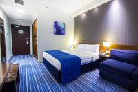 Holiday Bahrain Hotelにあるベッド