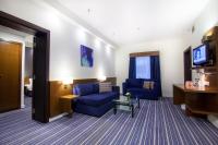 Holiday Bahrain Hotelにあるテレビまたはエンターテインメントセンター