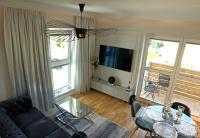 Telewizja i/lub zestaw kina domowego w obiekcie Blue Velvet Premium Apartments II