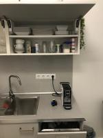 Kuchyňa alebo kuchynka v ubytovaní City Corso Apartman
