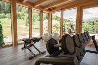 Posilňovňa alebo fitness centrum v ubytovaní Tevini Dolomites Charming Hotel