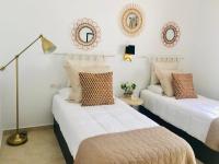 Posteľ alebo postele v izbe v ubytovaní Canaryislandshost l My Nest