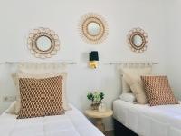 Posteľ alebo postele v izbe v ubytovaní Canaryislandshost l My Nest