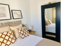 Posteľ alebo postele v izbe v ubytovaní Canaryislandshost l My Nest