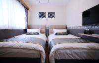 SHINJUKU GLOBAL HOTELにあるベッド