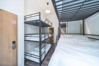 Łóżko lub łóżka w pokoju w obiekcie Hostel Orange