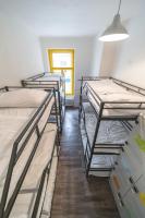 Łóżko lub łóżka w pokoju w obiekcie Hostel Orange
