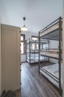 Łóżko lub łóżka w pokoju w obiekcie Hostel Orange