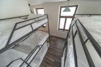 Łóżko lub łóżka w pokoju w obiekcie Hostel Orange