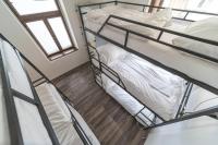 Łóżko lub łóżka w pokoju w obiekcie Hostel Orange