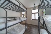 Łóżko lub łóżka w pokoju w obiekcie Hostel Orange