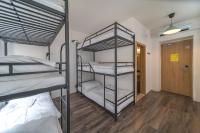Łóżko lub łóżka w pokoju w obiekcie Hostel Orange
