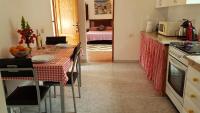 Kuchyň nebo kuchyňský kout v ubytování Vivelorural Ático y terraza en El Risco de Agaete