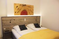 Postel nebo postele na pokoji v ubytování City Hotel Bamberg