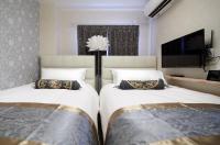 SHINJUKU GLOBAL HOTELにあるベッド