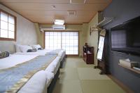 SHINJUKU GLOBAL HOTELにあるベッド