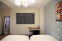SHINJUKU GLOBAL HOTELにあるベッド