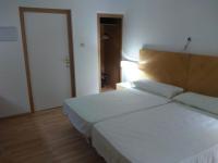 Postel nebo postele na pokoji v ubytování Nuevo Hotel Vista Alegre
