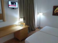Postel nebo postele na pokoji v ubytování Nuevo Hotel Vista Alegre