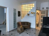 TV a/nebo společenská místnost v ubytování Sunflowers Apartman