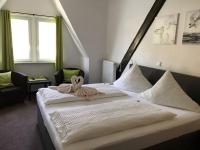 Postel nebo postele na pokoji v ubytování Haus Burgfrieden Cochem