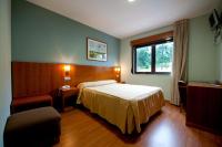 Postel nebo postele na pokoji v ubytování Hotel O Noso Portosin