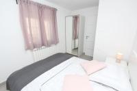 Posteľ alebo postele v izbe v ubytovaní Apartments Polenta